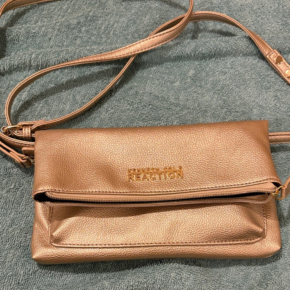 Kenneth Cole Reaction gold faux leather crossbody bag.